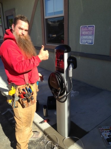 Bohner from Alchemy Construction finishing up the ChargePoint Station in Eureka.